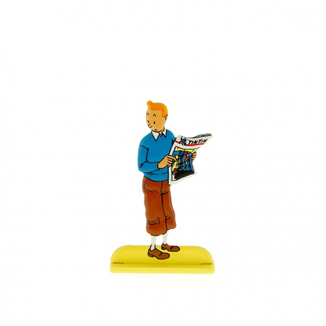 Tintin segura a Revista Tintin